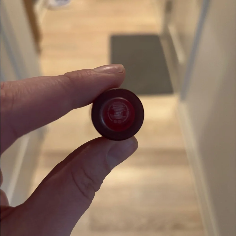 Glossier G Suit soft touch lip crème in jet